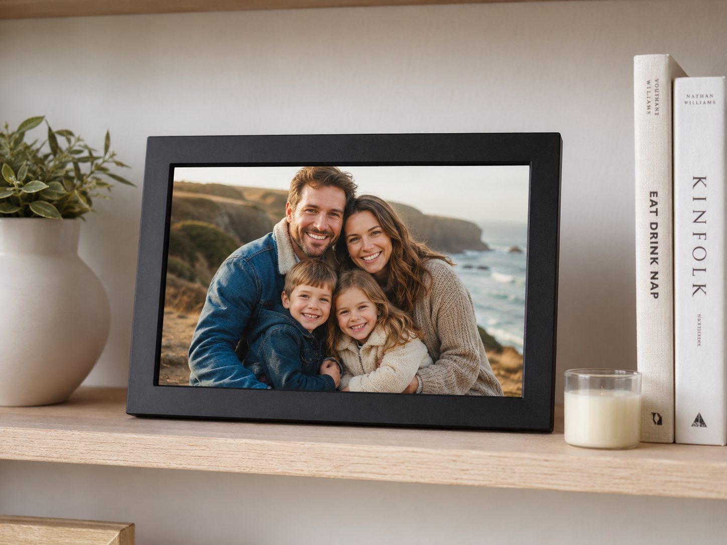 A digital photo frame displaying a family photo on a shelf — Easy Street setup by Digitize DFW